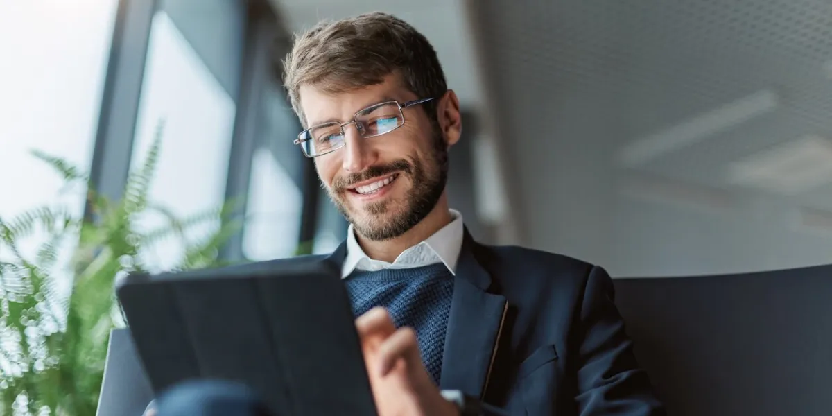 thoughtful business man with a digital tablet close-up