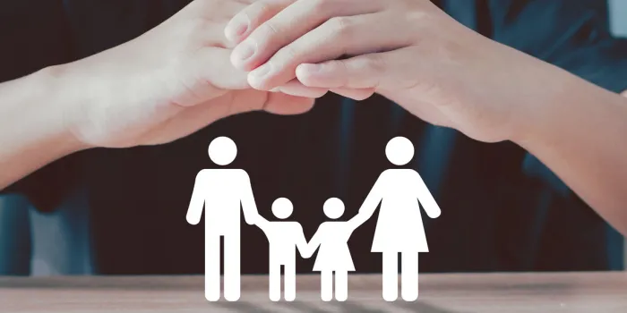 businessman using hand with protective gesture and family insurance icon health insurance concept life insurance and family policy concepts