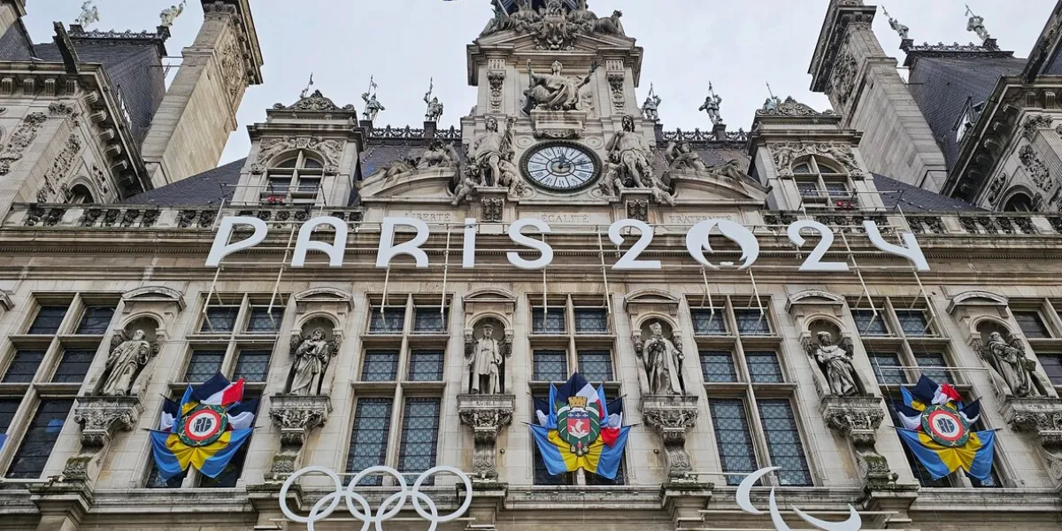 paris, france - january 1, 2024  facade of the paris city hall (l'hôtel-de-ville) announcing the paris 2024 olympic games