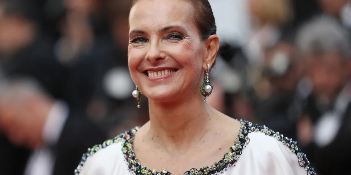 french actress carole bouquet poses as she arrives on may 23, 2017 for the '70th anniversary' ceremony of the cannes film festival in cannes, southern france (photo by valery hache   afp)