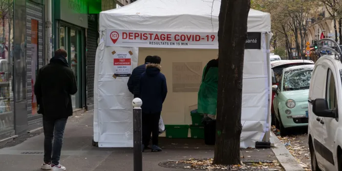 paris, france - november 13 2020  covid-19 rapid testing medical tent in front of a pharmacy
