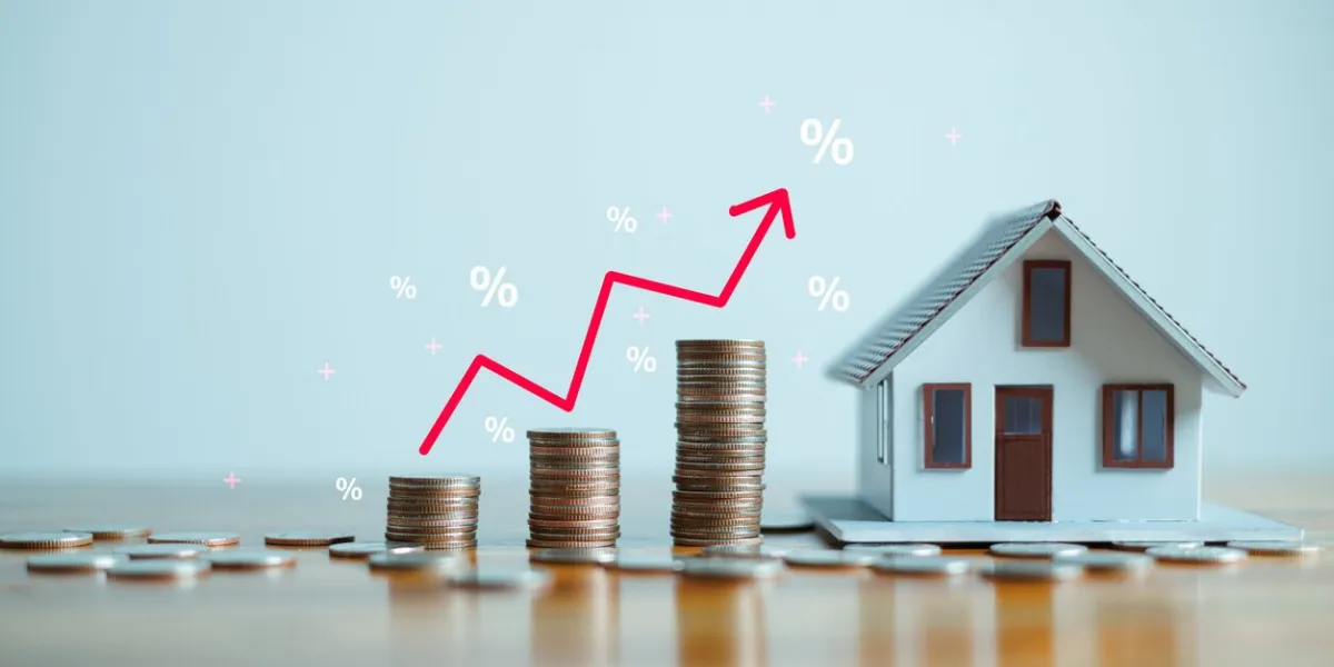 the up arrow shows the inflation rate interest rates increase, home loan, mortgage, house tax investment and asset management concept percentage for increasing interest rates with stacks coins