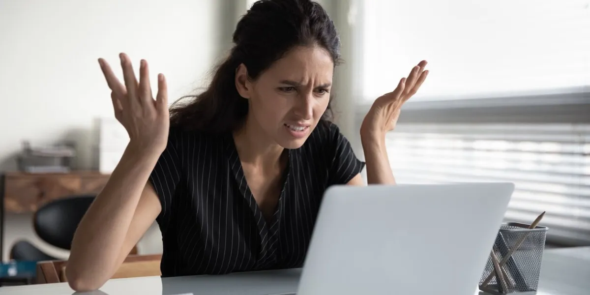 what is wrong anxious angry hispanic female splash hands unable to access database on laptop forgetting password having weak wifi signal mad shocked young woman worker losing job result on broken pc