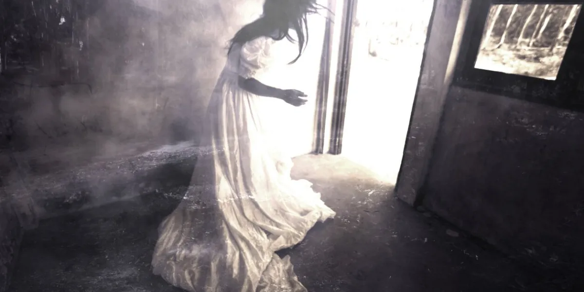 ghost in haunted house,mysterious woman in white dress standing in abandon building,horror background for halloween concept and book cover ideas