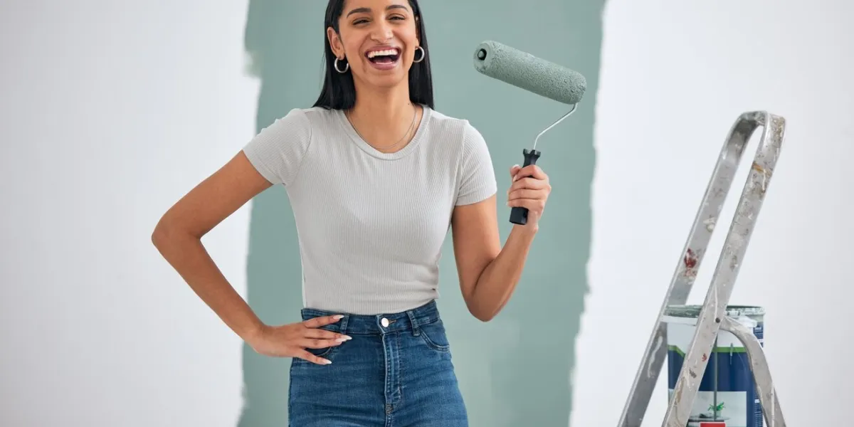 painting, ladder and hardware of woman in home renovation, room design color, and project development wall with excited portrait eco friendly green paint, brush and excited or happy woman painter