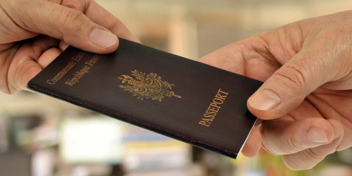 identity concept with a passport held in close-up