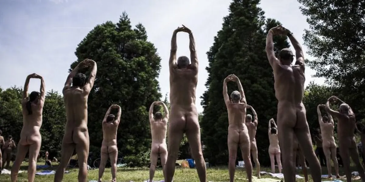 editors note  graphic content   naturists practice yoga in the bois de vincennes on the outskirts of paris on june 24, 2018    afp photo   philippe lopez