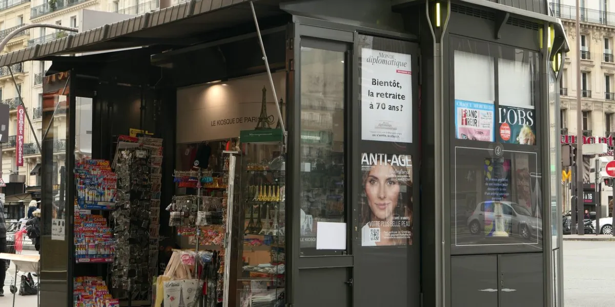 paris, france may 11 2022 point of sale of newspapers in the famous district of montparnasse