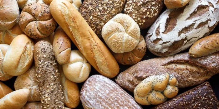 many mixed breads and rolls shot from above