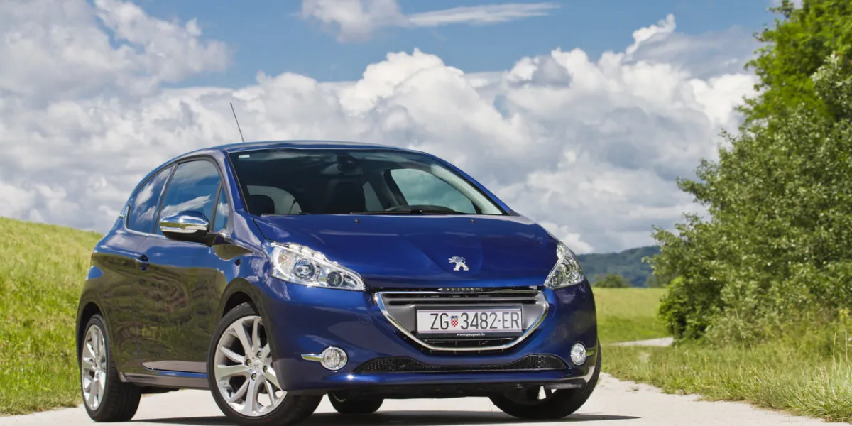 zagreb, croatia - june 5th, 2012  new peugeot 208 parked on a path by the mound of river sava new generation of peugeot bestseller is smaller and lighter than 207 and is a spiritual predecessor of iconic