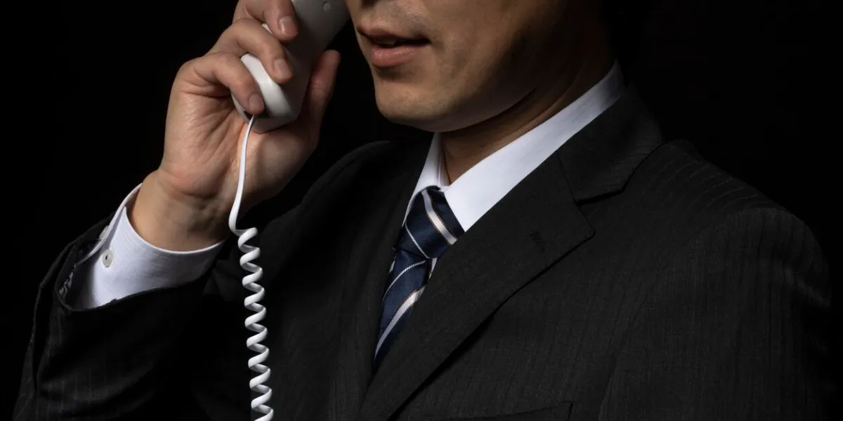 men talking on the phone