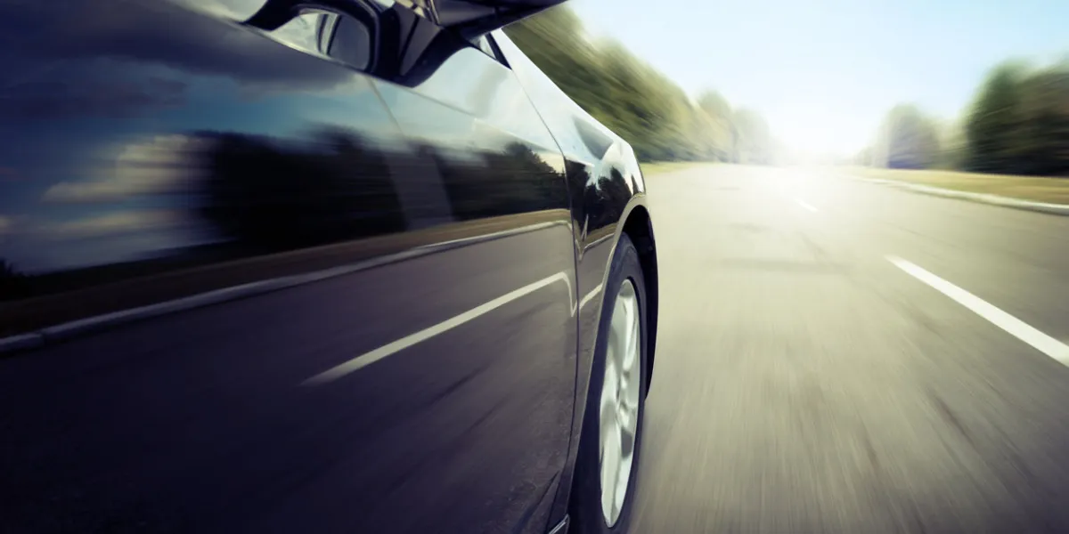blurred road and car, speed motion