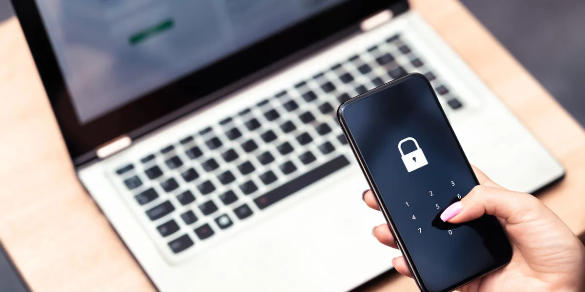 phone password lock for mobile cyber security or login verification passcode in online bank app data privacy and protection from hacker, identity thief or cybersecurity threat laptop and smartphone