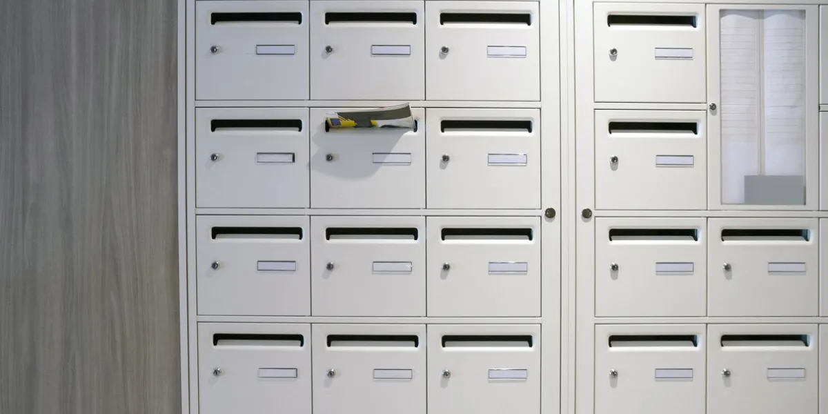 group of mailboxes in the lobby of a building