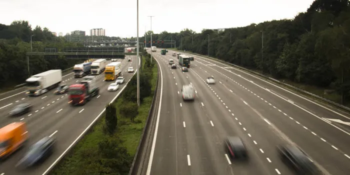 the highway (ring) around antwerp in belgium with cars and speed signals