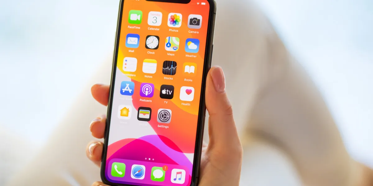 riga, latvia - december 3, 2019  woman using apple iphone 11 pro