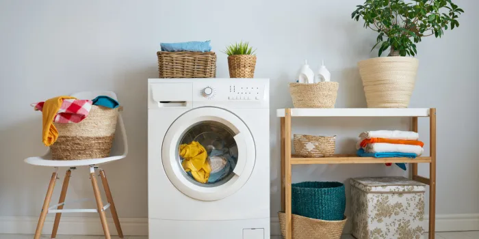 interior of a real laundry room with a washing machine at home