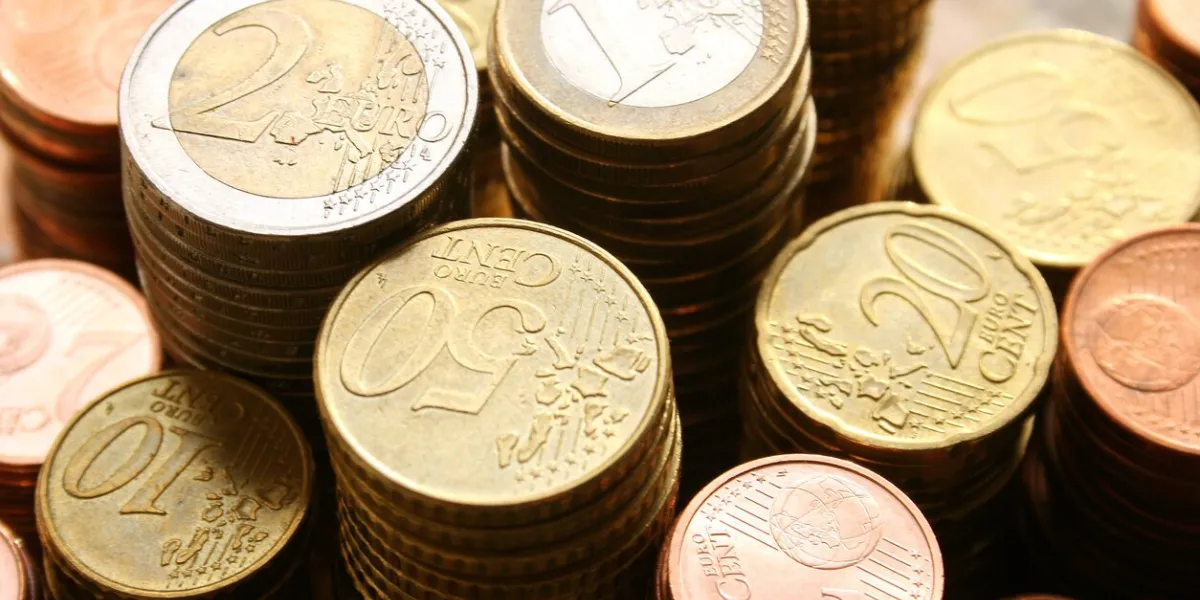 stacks of euro coins of different denominations