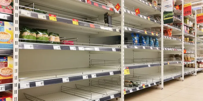 kaunas, lithuania - february 29, 2020  empty shelves in a maxima supermarket shortages of products and oats supplies during panic of corona virus