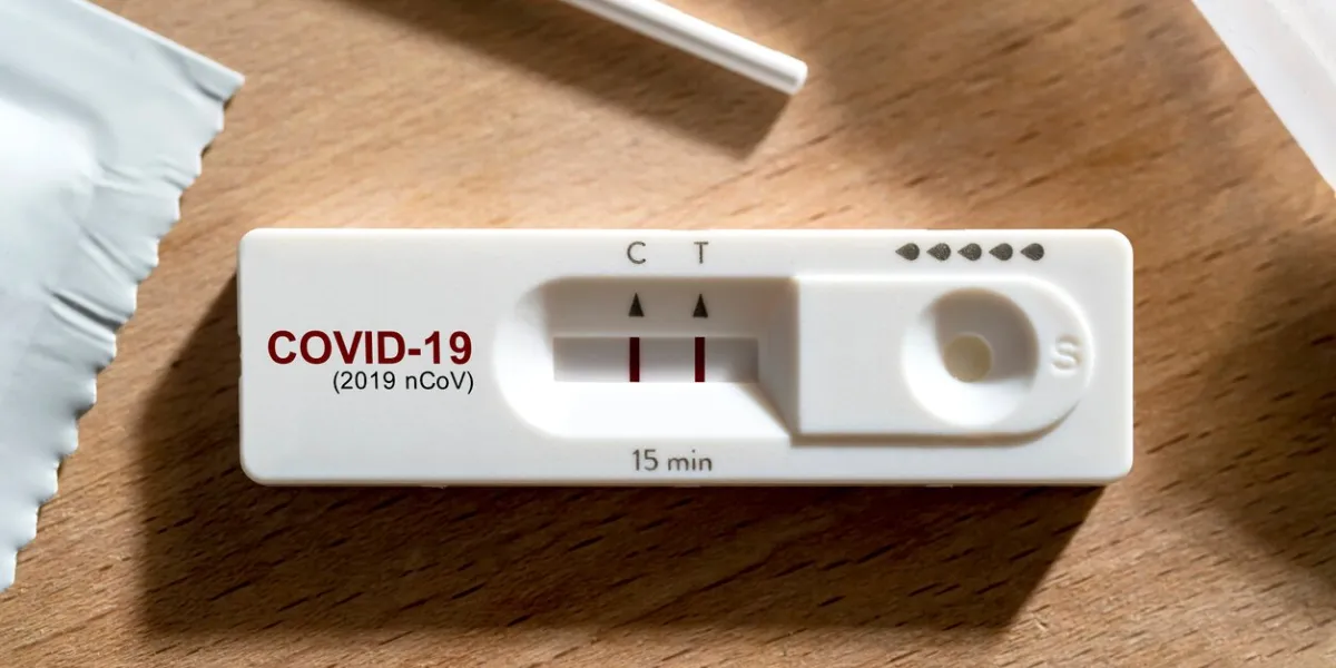 close up positive show result of covid infected show on nasal rapid self test kit at home