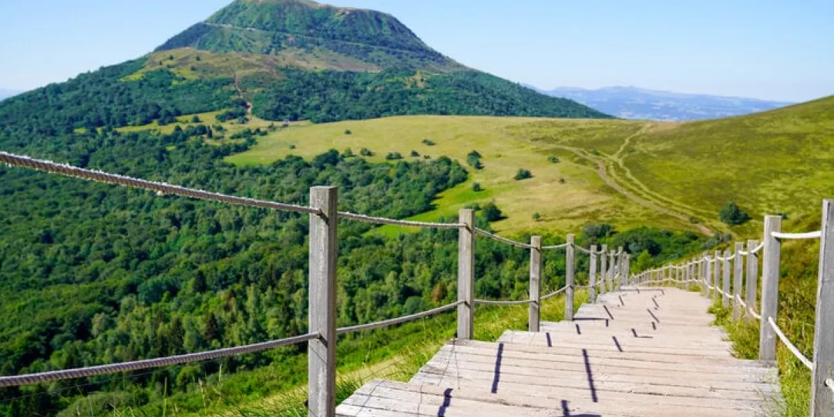 staircase wooden for access to the puy de dôme volcano in auvergne france