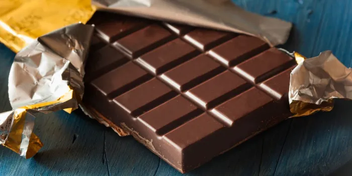 organic dark chocolate candy bar in a wrapper