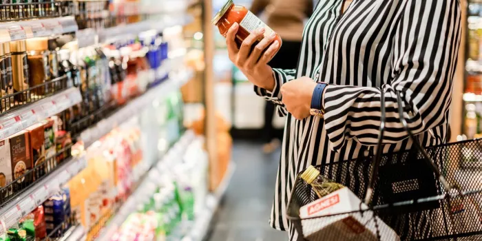 bangkok, thailand - august 5, 2019  woman chooses products in the supermarket, ready-made food, shopping