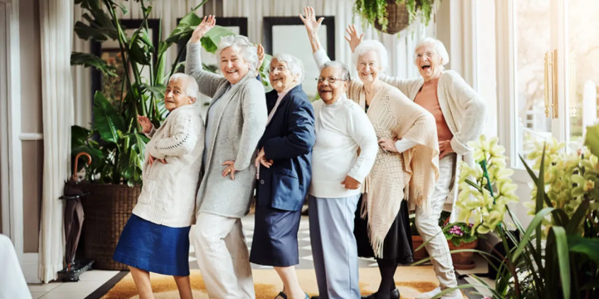 portrait of a group of happy senior women having fun together at a retirement home