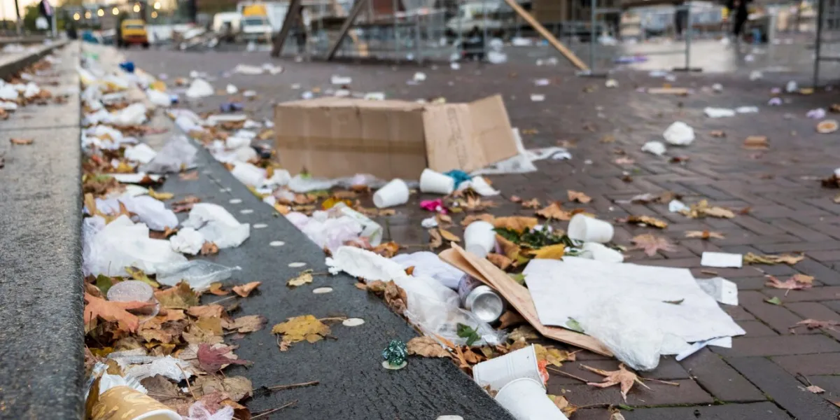 litter left on the street after the weekly market, rotterdam, the netherlands