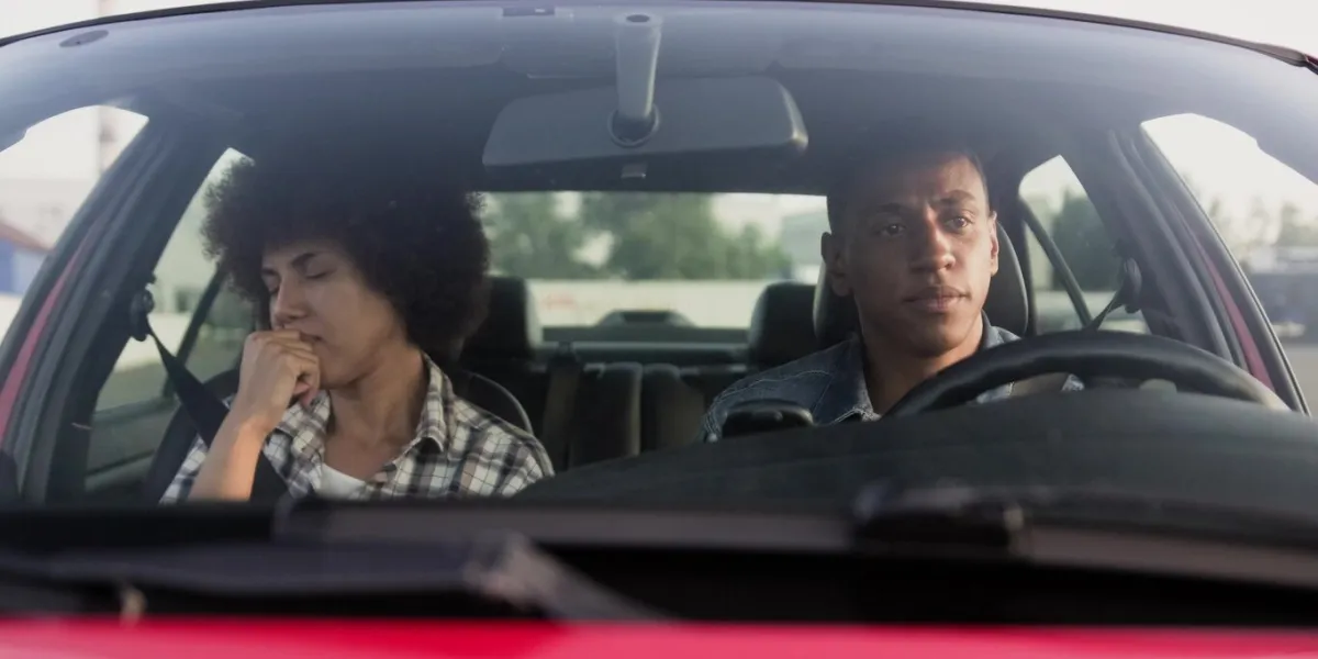 young couple travelling by car together, woman upset lifestyle, relationship, transportation, trip, people concept slow motion