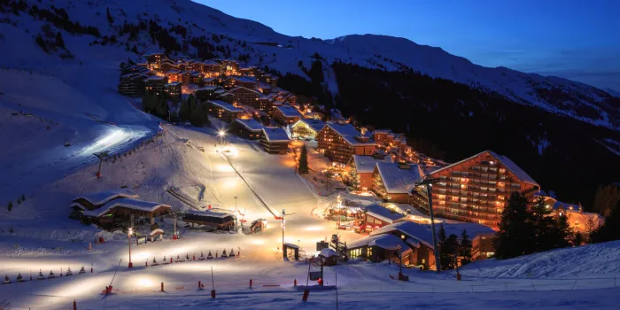 the slopes of a ski resort (meribel - mottaret, france) in the evening