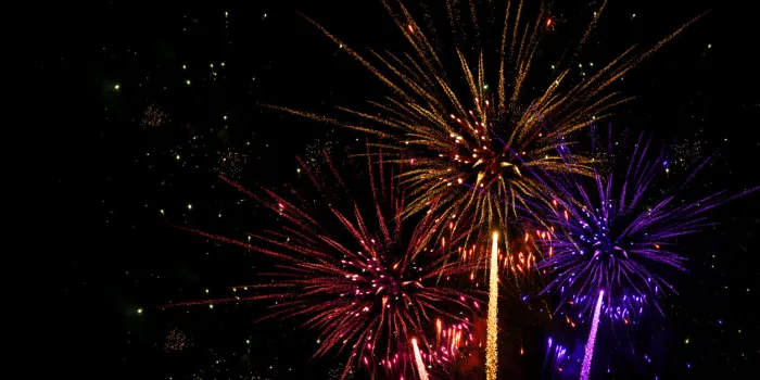 happy new year - celebration new year's eve, silvester 2023 holiday background greeting card - colorful firework fireworks pyrotechnics on dark night sky