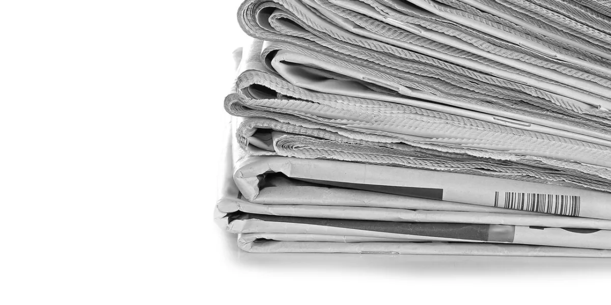 pile of newspaper on table no people with white background stock photo