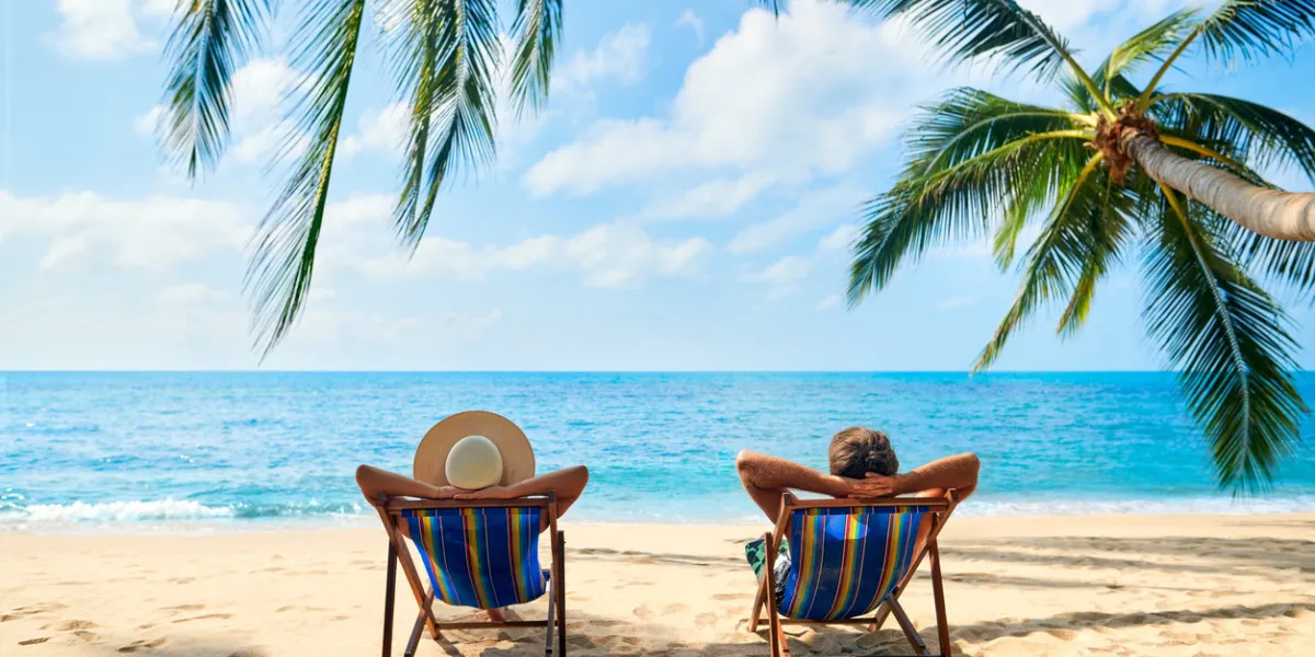 couple relax on the beach enjoy beautiful sea on the tropical island summer beach vacation concept