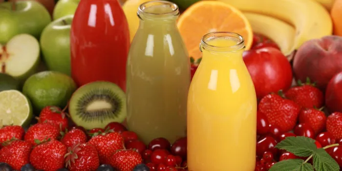 fresh fruit juices made from red, green and orange fruits