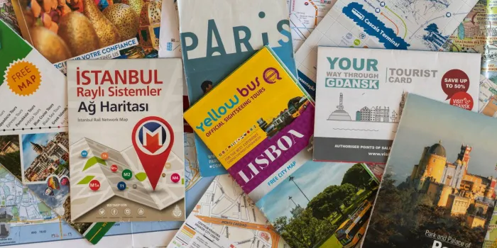 lviv, ukraine - june 19, 2022 tourist maps and city guides from different countries