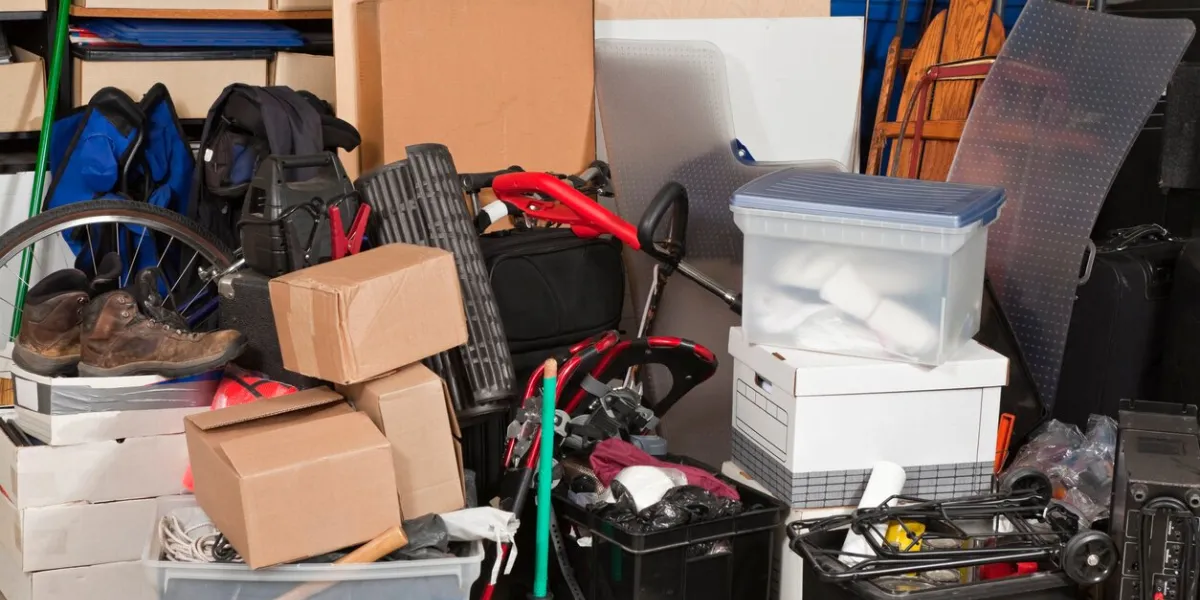 pile of boxes junk inside a residential garage
