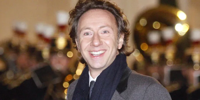 l'hôte de télévision français stéphane bern sourit alors qu'il arrive pour un dîner d'État avec le roi et la reine de suède au palais présidentiel d'elysée à paris le 2 décembre 2014 afp photo matthieu alexandre afp photo matthieu alexandre