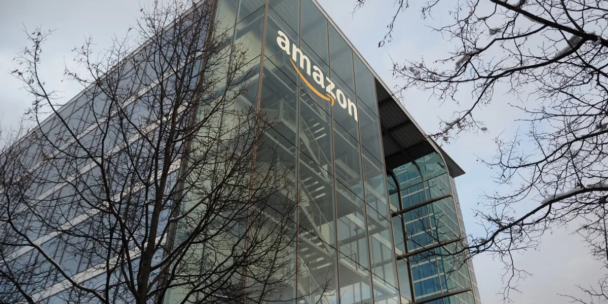 munich, bavaria germany - december 11 2022  amazon deutschland services gmbh e-commerce german headquarters office building with glass green trademark logo ultra hd