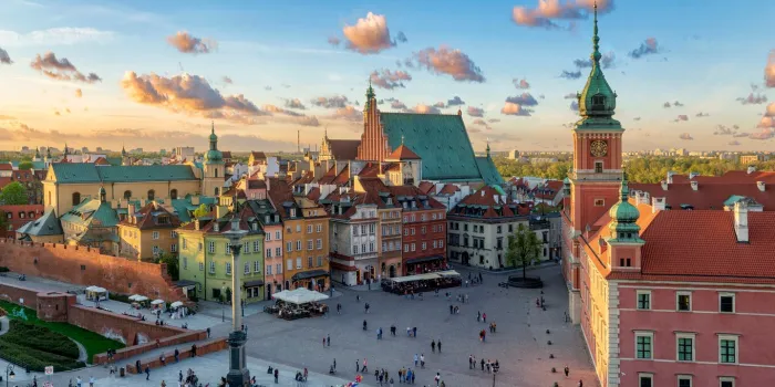 warsaw, royal castle and old town at sunset