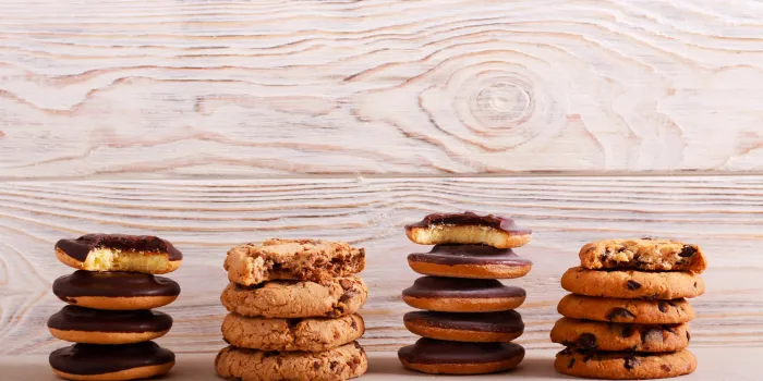 selection of girl scout cookies over white wooden background