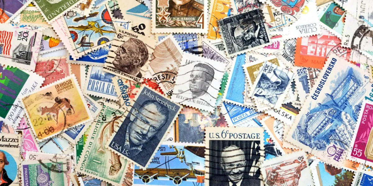 cairo, egypt, december 10 2021  a collection of old historic used postage stamps from various countries of the world of different times, places and values, selective focus of many post stamps