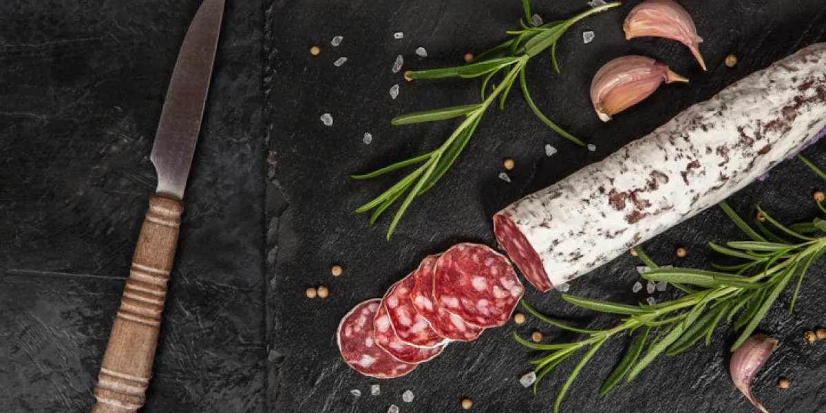 traditional italian salami on dark background