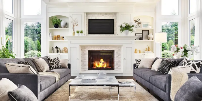 beautiful living room with fireplace in luxury home
