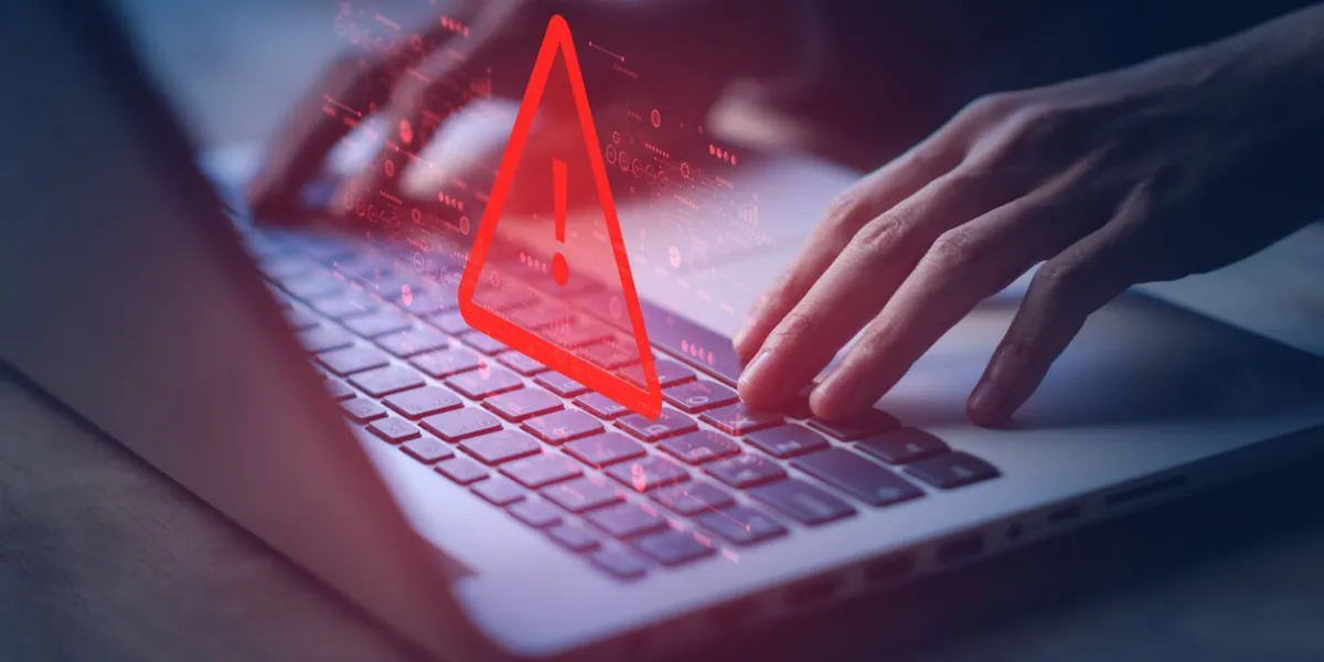 system hacked warning alert on notebook (laptop) cyber attack on computer network, virus, spyware, malware or malicious software cyber security and cybercrime compromised information internet