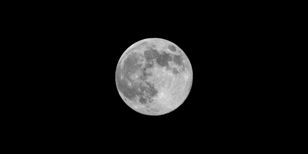 full moon isolated on black night sky background