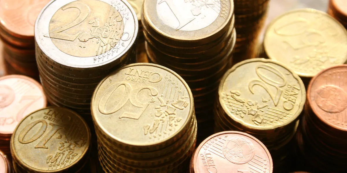 stacks of euro coins of different denominations