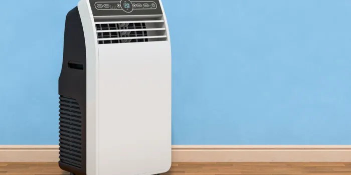 portable air conditioner in room near wall, 3d rendering