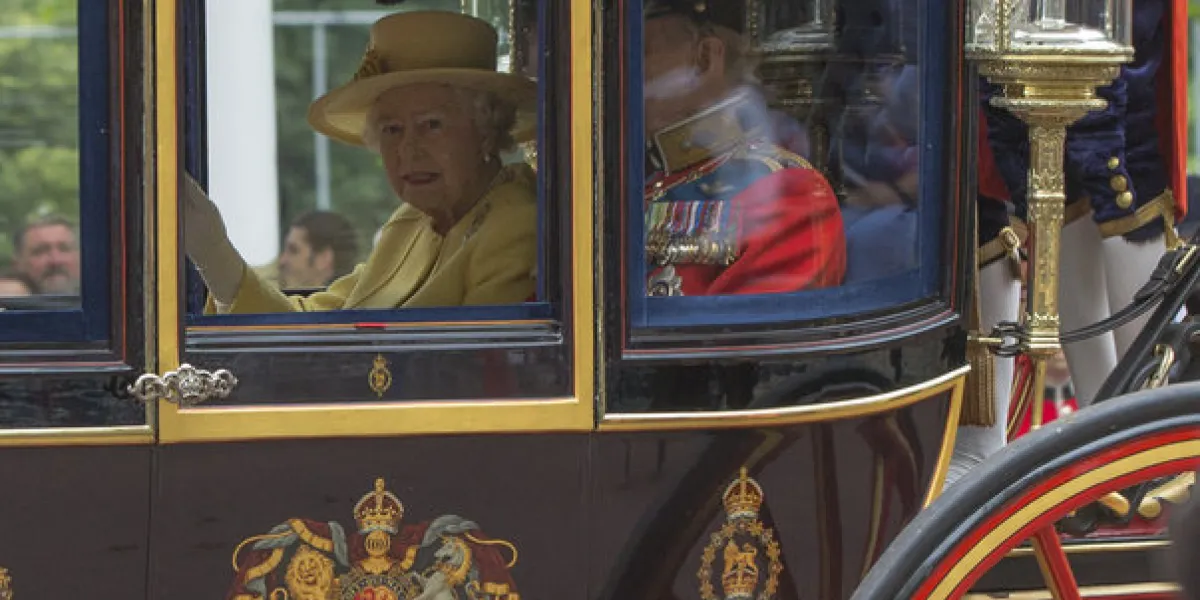 london, england - june 16, 2012  queen elizabeth ii and the duke of edinburgh in a carriage on the mall en route from buckingham palace for the trooping of the colours at the horseguards parade