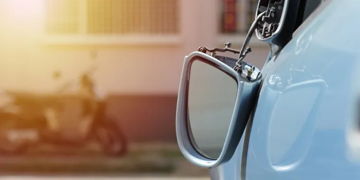 close up car wing mirror, side view mirror broken from accident car insurance concept